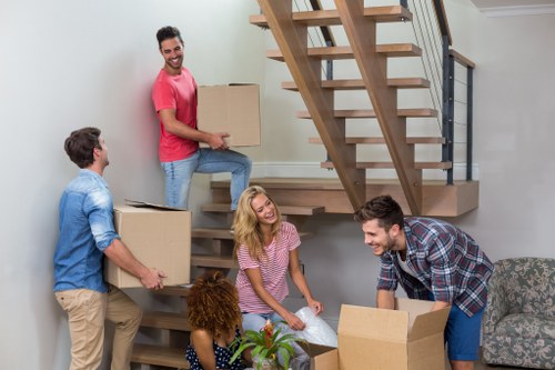 Student removals team preparing boxes for a Bermondsey flat move