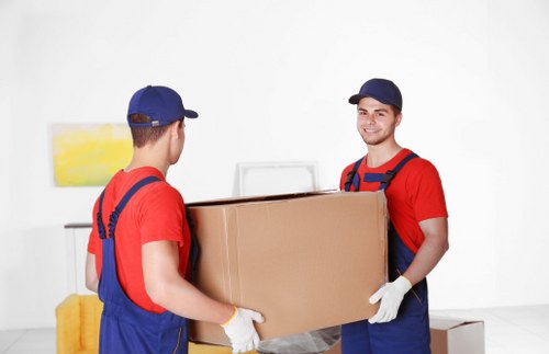 Loading furniture into a removal truck for a local relocation
