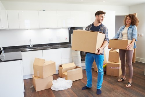 Office desks and chairs prepared for transport