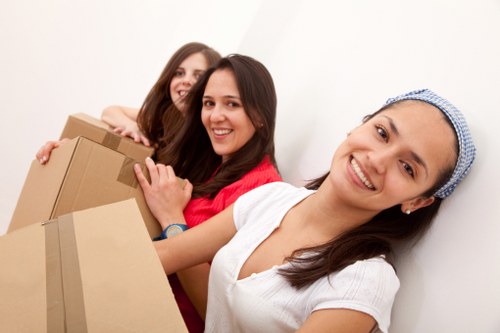 Careful handling of furniture in a Bermondsey apartment building