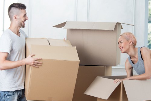 Careful loading of household items into a moving van