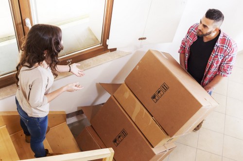 Boxes and furniture being loaded for an apartment relocation