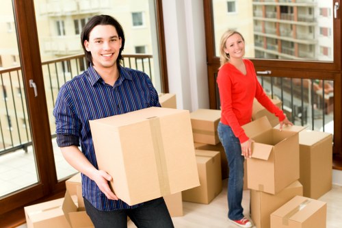 Local moving team handling boxes and furniture in Bermondsey